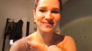German Slut oils her tits
