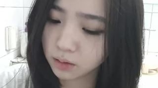Beautiful Korean girl fuck a door knob