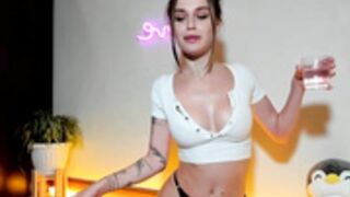 Her perfect boobs get so tight she has to wet her top