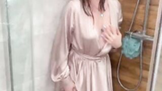 Shower show in silk bathrobe