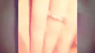 Girl plays with pussy